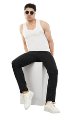 White tank top styled for casual wear, paired with complementary lifestyle accessories.